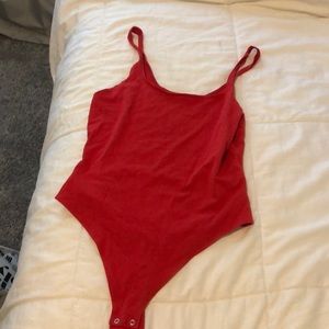 red bodysuit